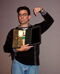 [Derek points to his dissected PowerBook]