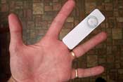 iPod shuffle on finger