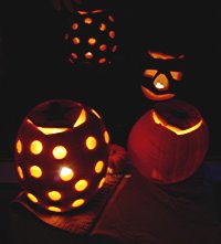 [Jack-o-lanterns at night]