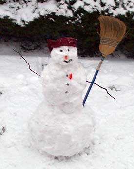 [Snowman with broom]